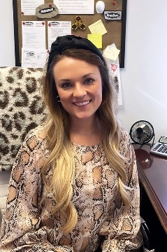 a woman smiling for the camera