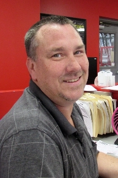 a man smiling for the camera