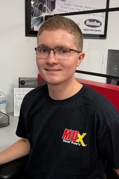 a man smiling for the camera