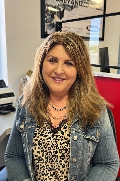 a woman smiling for the camera